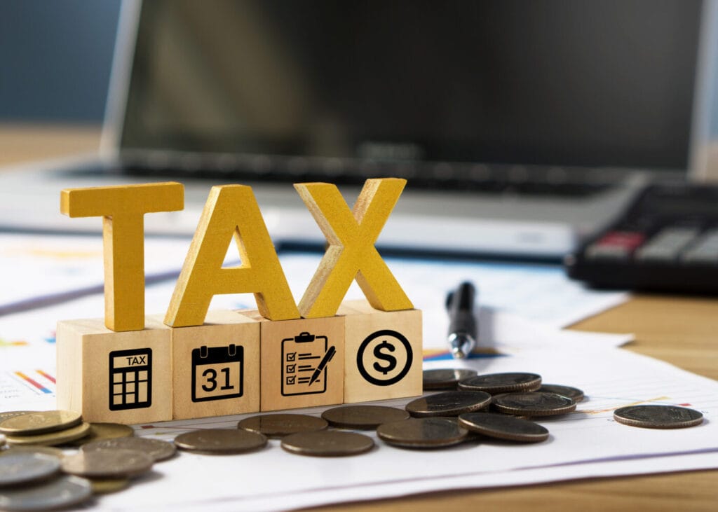 Wooden tax letters representing tax return accountant services